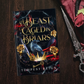 A Beast Caged in Briars (FaeBound Fate, Book 1)